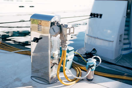Chrome plated cabinet for marina refueling and water replenishment. Refueling and charging of yachts.の写真素材