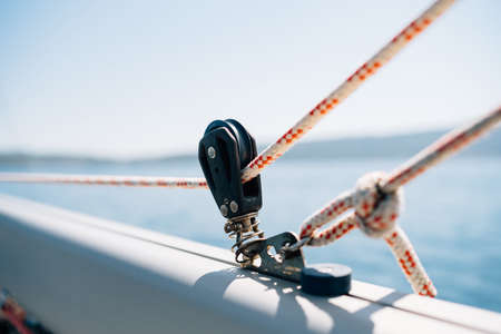Close-up of a winch on white sailing yachtの写真素材