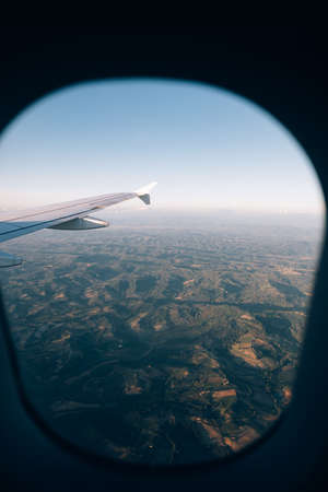 View from the plane window of the mountain ranges of Tuscanyの写真素材