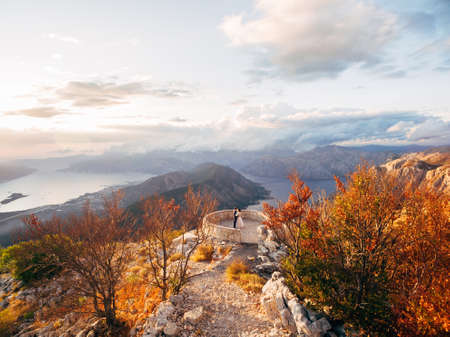 Newlyweds on the background of the Kotor Bay. View from Mount Lovcen Montenegroの写真素材