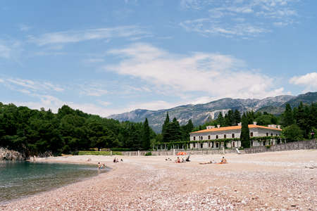 People are relaxing on the beach near Villa Milocer. Budva, Montenegroの写真素材