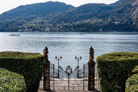 Forged metal gate of Villa Carlotta overlooking Lake Como. Italyの写真素材