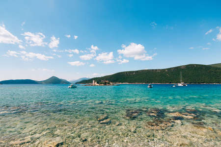 Otocic Gospa island in the Kotor Bay with mountains in the background. Montenegroの写真素材