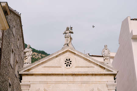 Sculptures above the entrance to the Catholic Church of Saint apostle Mark. Montenegroの写真素材