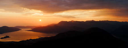 Mountains in the dark against the sunset sky. Mount Lovcen, Montenegroの写真素材