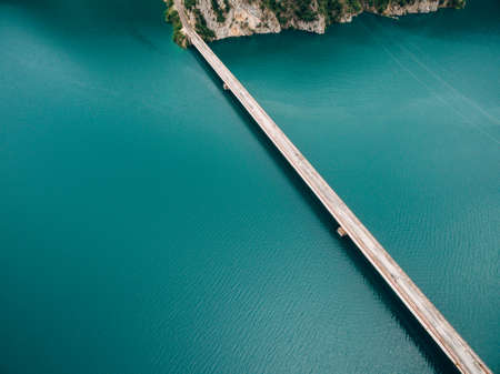 Long road bridge across Lake Piva in Montenegro. Droneの写真素材