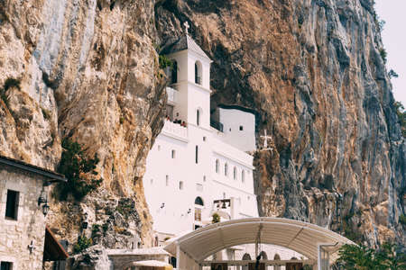 Facade of the Ostrog monastery in the rock. Montenegroの写真素材