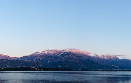 Sunset over Mount Lovcen. View from the sea