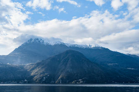 White clouds over the ridge. Lake Como, Italy