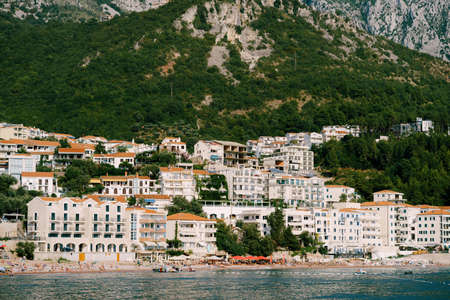 Buildings with red tiled roofs in Sveti Stefan villageの写真素材