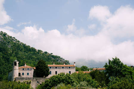 Podmaine monastery surrounded by mountains. Budva, Montenegroの写真素材