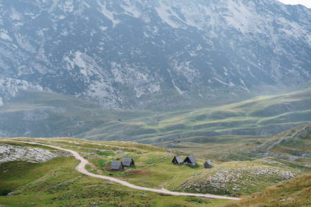Mountain valley with triangular houses in the north of Montenegroの写真素材