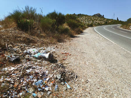 Pile of garbage along the mountain road