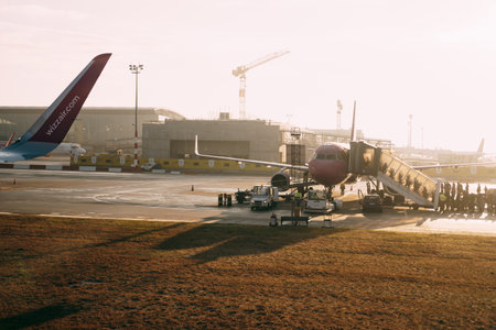 Podgorica, Montenegro - 02 july 2020: An airport with planes at the sunset.