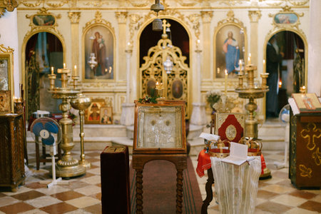 Podgorica, Montenegro - 03.07.21: Iconostasis around the altar in the church with white columnsのeditorial素材
