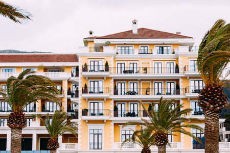 Tivat, Montenegro - 26.11.21: Regent Hotel is set against a backdrop of palm trees in Porto. Montenegroのeditorial素材