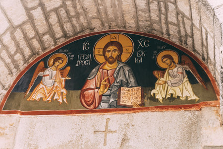 Ostrog, Montenegro - 03.07.21: Icon of the wisdom of God in an arch on a stone wall of an Orthodox churchのeditorial素材