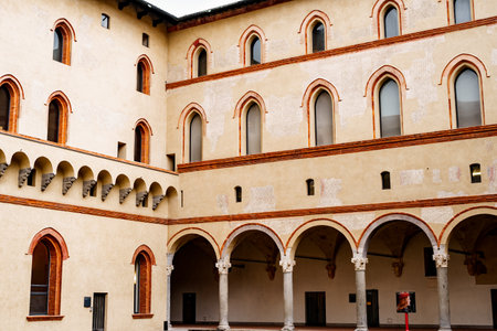 Milan, Italy - 07.04.18: Portico with arched vaults in the courtyard of Castello Sforzesco. Milan, Italyのeditorial素材