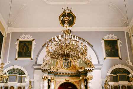 Dubrovnik, Croatia - 05.06.17: Luxurious chandelier in front of the altar of the Church of the Holy...
