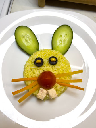 Rice with vegetables in the shape of a rabbit headの写真素材