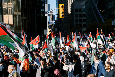 Toronto, Canada - 28 October 2023: Anti-war march in Toronto by Palestinians against Israels...