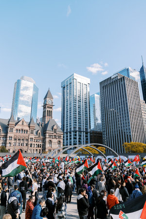 Toronto, Canada - 28 October 2023: Large gathering in Toronto protesting Israeli operations in Gaza,...