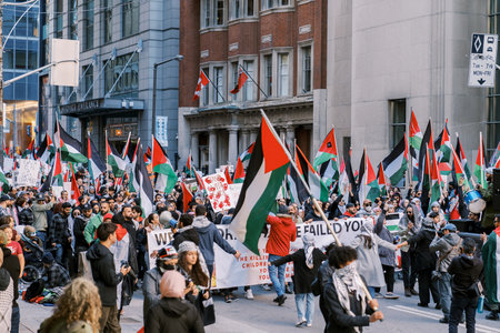 Toronto, Canada - 28 October 2023: Anti-war march in Toronto by Palestinians against Israels...