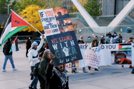Toronto, Canada - 28 October 2023: Anti-war march in Toronto by Palestinians against Israels...
