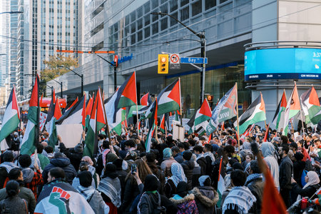 Toronto, Canada - 28 October 2023: Anti-war march in Toronto by Palestinians against Israels...