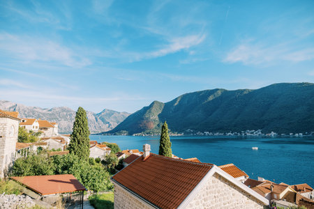 View over the red roofs of Perast houses to the Bay of Kotor. Montenegroの写真素材