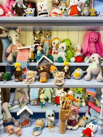 Kotor, Montenegro - 25 december 2022: Multi-colored soft knitted toys on the shelves in the storeのeditorial素材