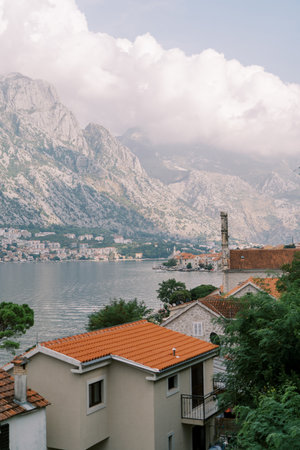 View of the Bay of Kotor above the red tiled roofs of the old town. Montenegro