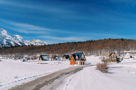 Colorful cottages in Durmitor National Park at the foot of the snowy mountains. Montenegroの写真素材