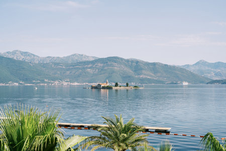 View from the shore of the island of Gospa od Milosti in the Gulf of Tivat. Montenegroの写真素材