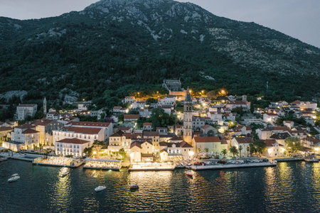 Coast of Perast in the sparkle of illumination at night. Montenegro. Droneの写真素材