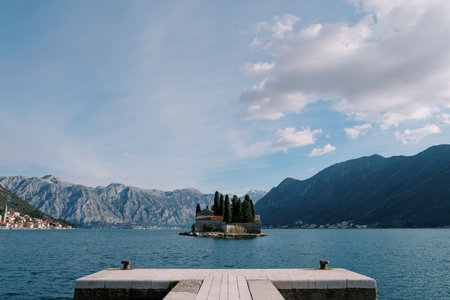 View from the pier to the island of St. George in the Bay of Kotor. Montenegroの写真素材