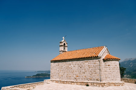 Ancient church of St. Sava on the top of the mountain above the Bay of Kotor. Montenegroの写真素材