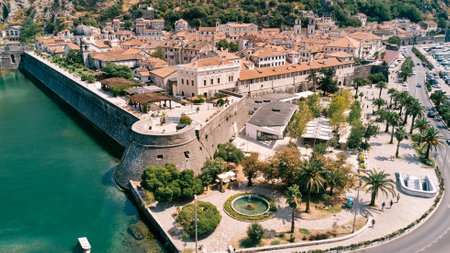 Park and a canal near the fortress walls of the ancient town. Kotor, Montenegro. Droneの写真素材