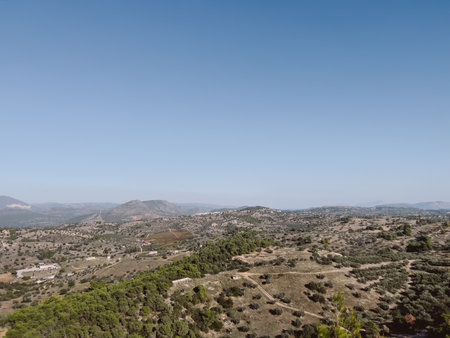Green bushes and pastures in the highlands.の写真素材