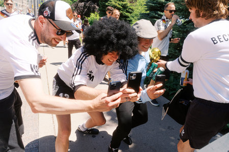 Toronto, Canada - June 20, 2026: German soccer fans taking selfies before FIFA World Cup match
