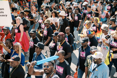 Toronto, Canada - June 29, 2025: Parade crowd celebrating Toronto Pride, spectators