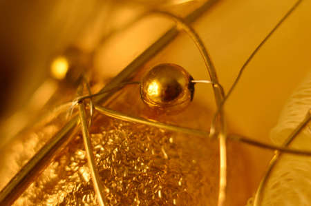 Christmas tree toy. Golden color. Abstractionの写真素材