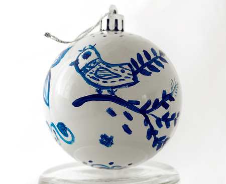 Handmade Christmas ball. Blue bird on a white background. Fabulous bird.の写真素材
