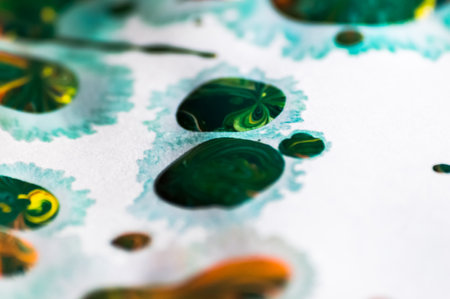 abstract background of water drops on a white paper. macro photographyの写真素材