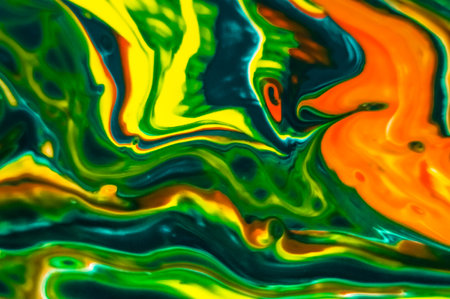 Abstract background of multicolored paint in water closeup macro