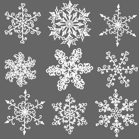 A set of   hand-drawn  snowflake with curlsのイラスト素材