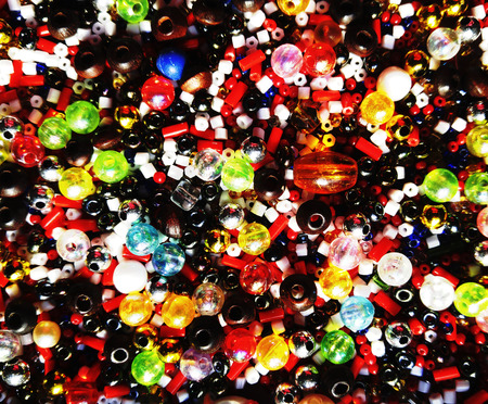 multicolored beads. background beads. for design. Background large number of beads. close-up.の写真素材