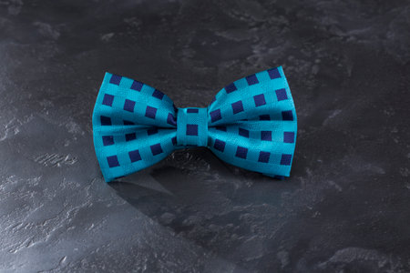 Bow tie on a beautiful dark gray background.