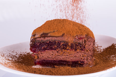 Chocolate cake with mousse filling and cherry.の写真素材