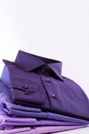 Shirts in purple tones on a white backgroundの写真素材